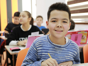 Young student in class.